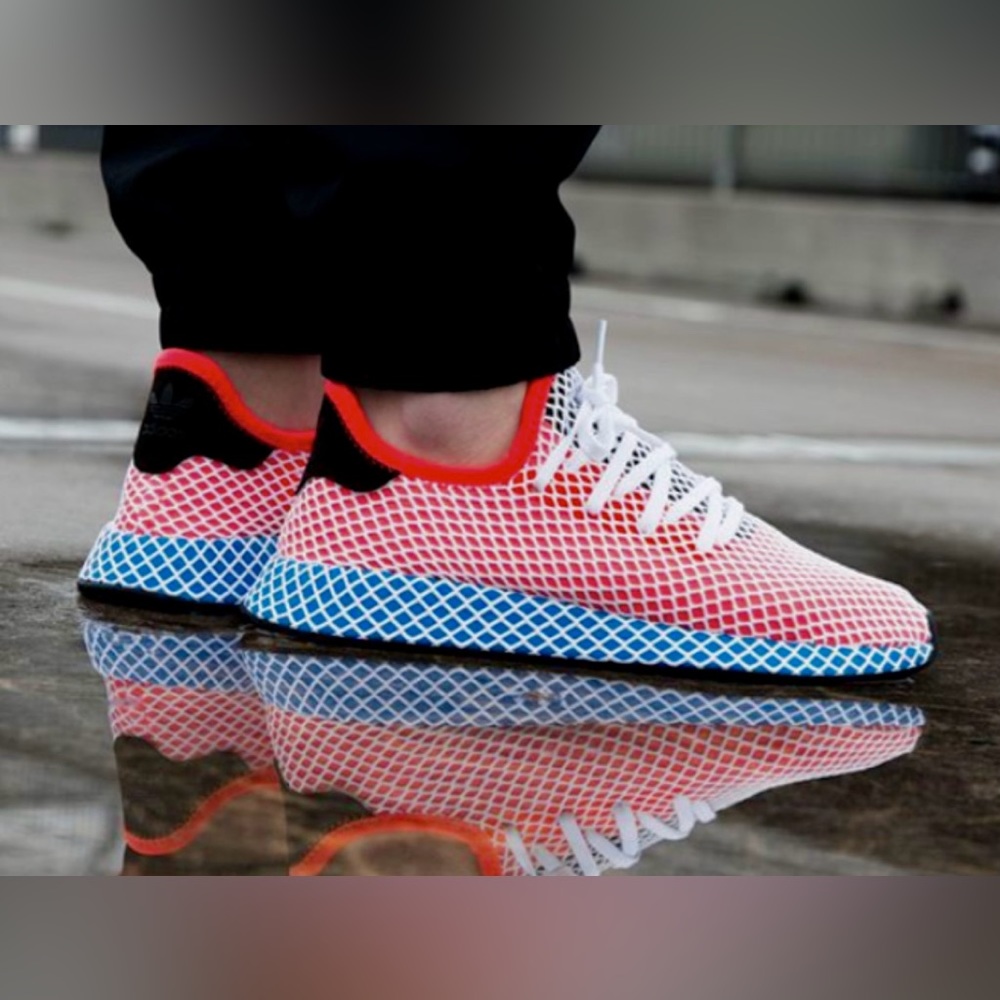 Adidas Deerupt Solar Red Bluebird
Size 5 1/2 Y